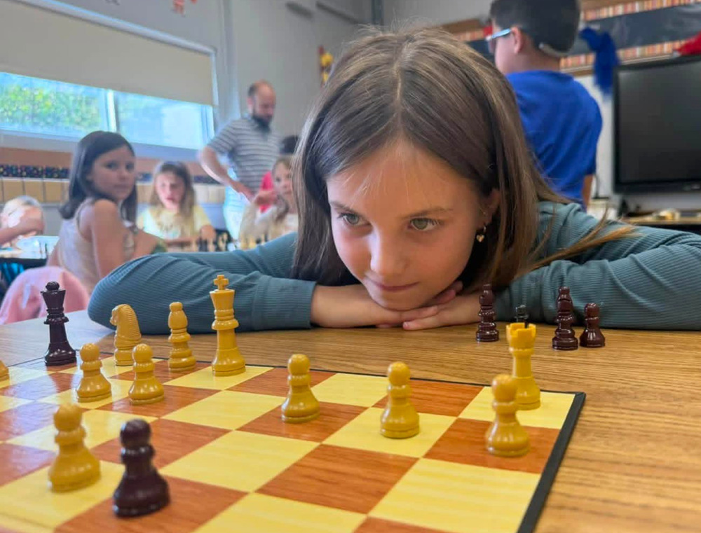 student playing chess