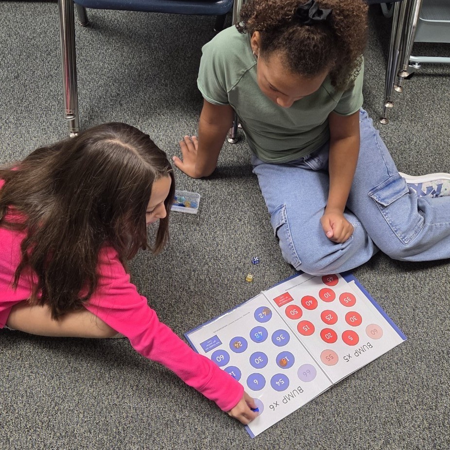 students play math game
