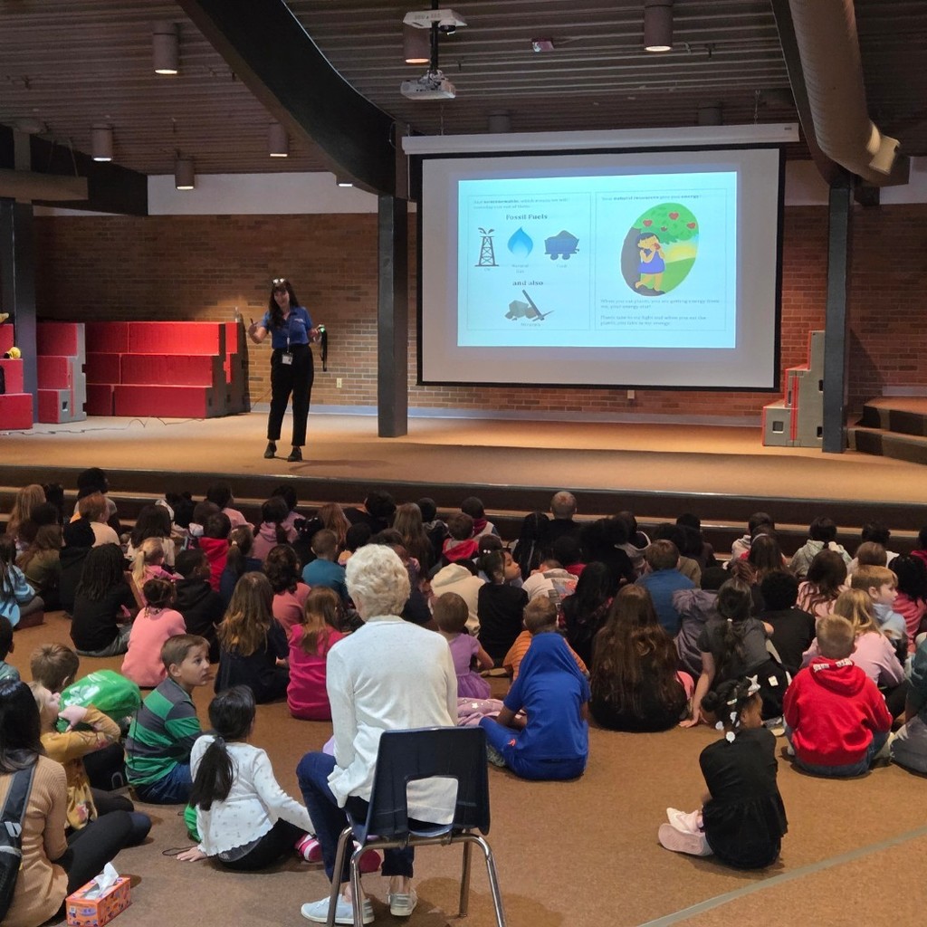 third graders listen to book about energy
