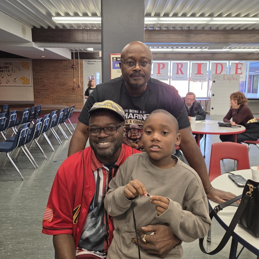 student with dad and uncle