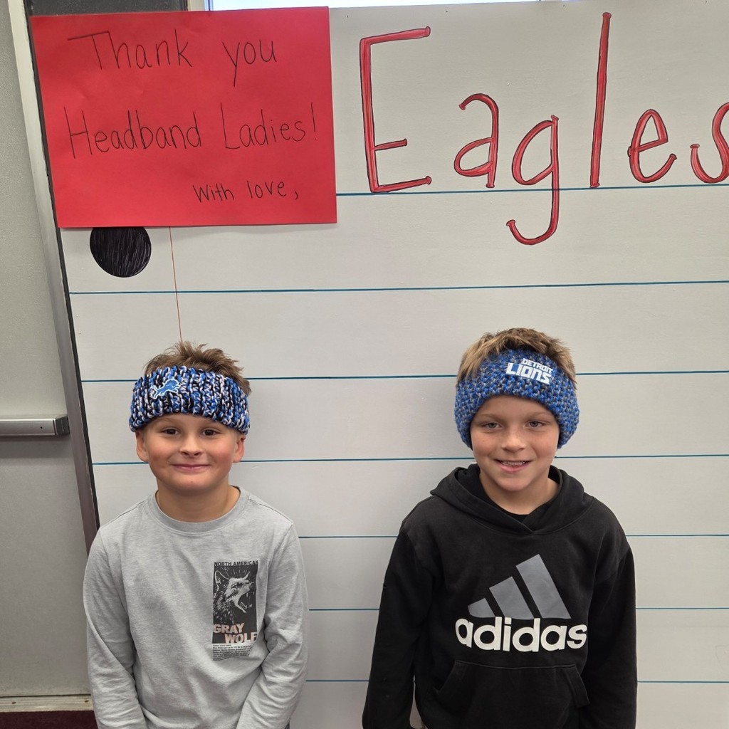 two boys in Lions headbands