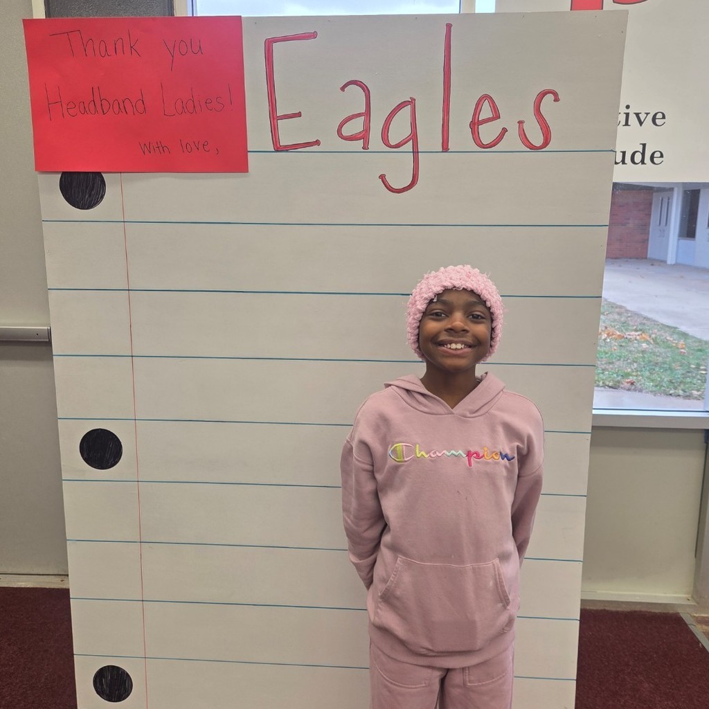 smiling student with new headband 