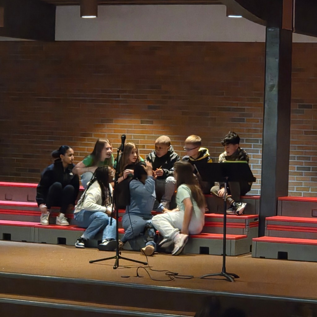 5th grade team huddled