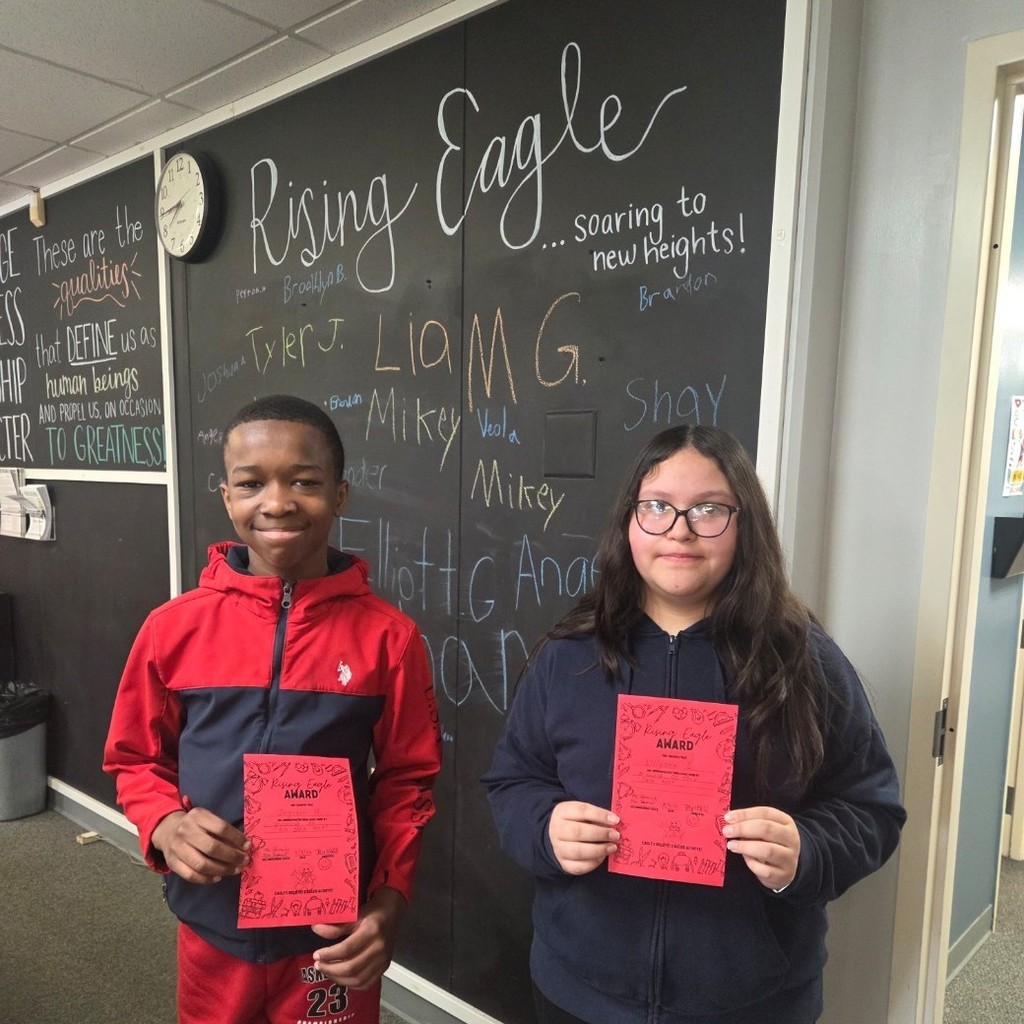 two students with their awards