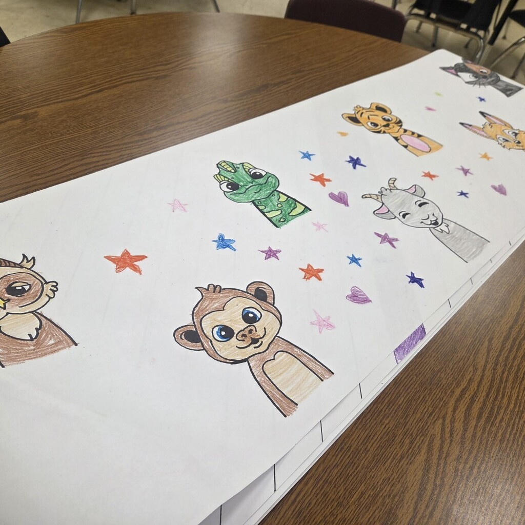 animal themed paper on table