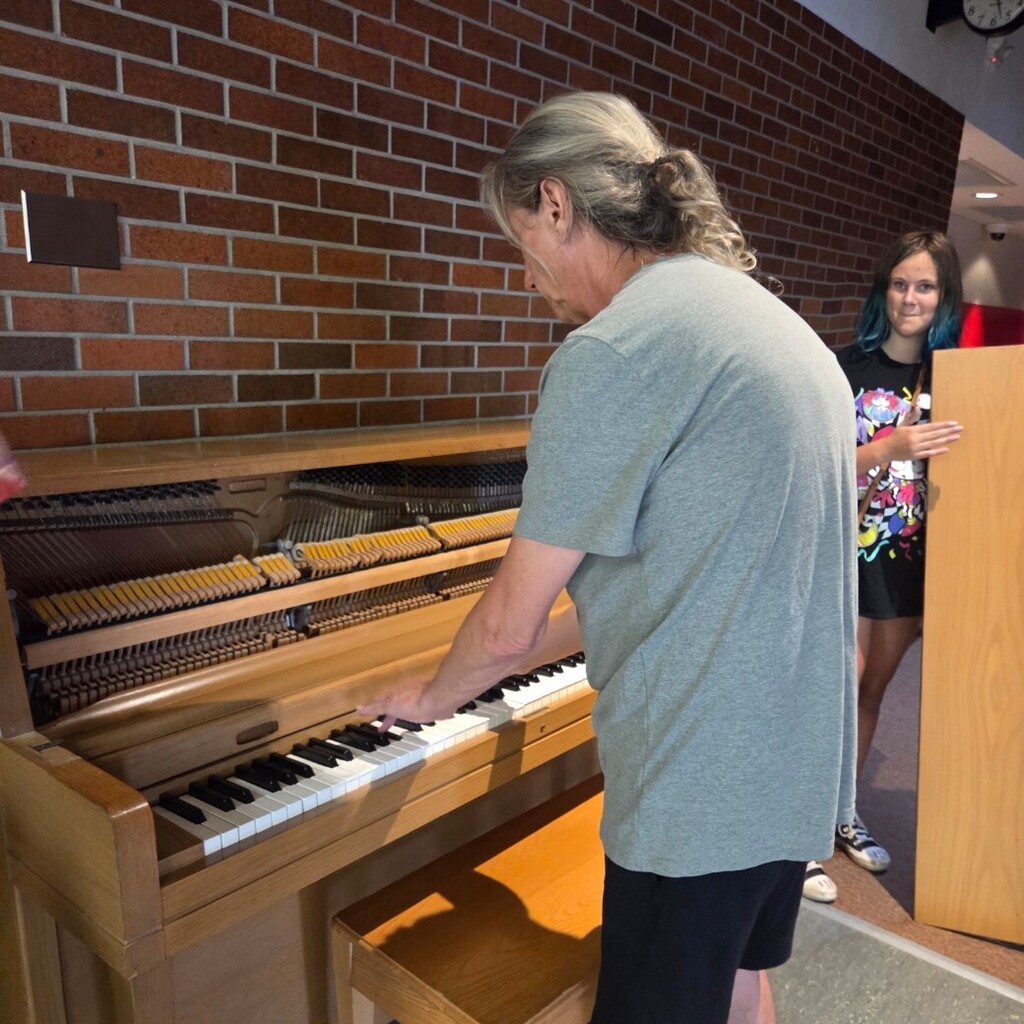 John plays piano