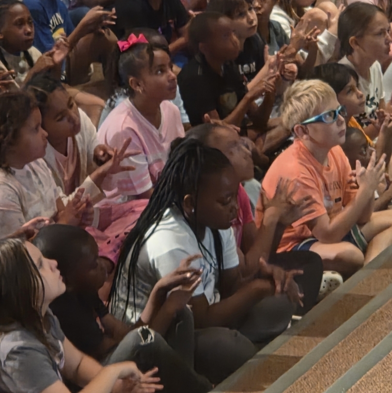 students follow along with 5 finger breathing