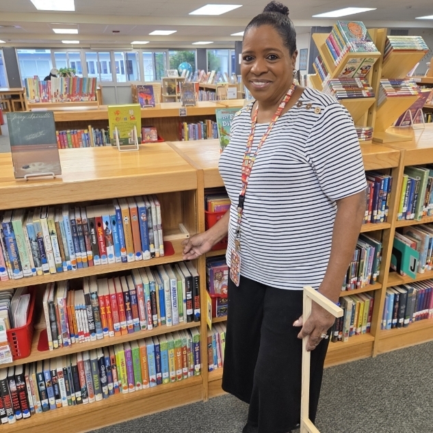 Mrs. Charity shows off shelf support