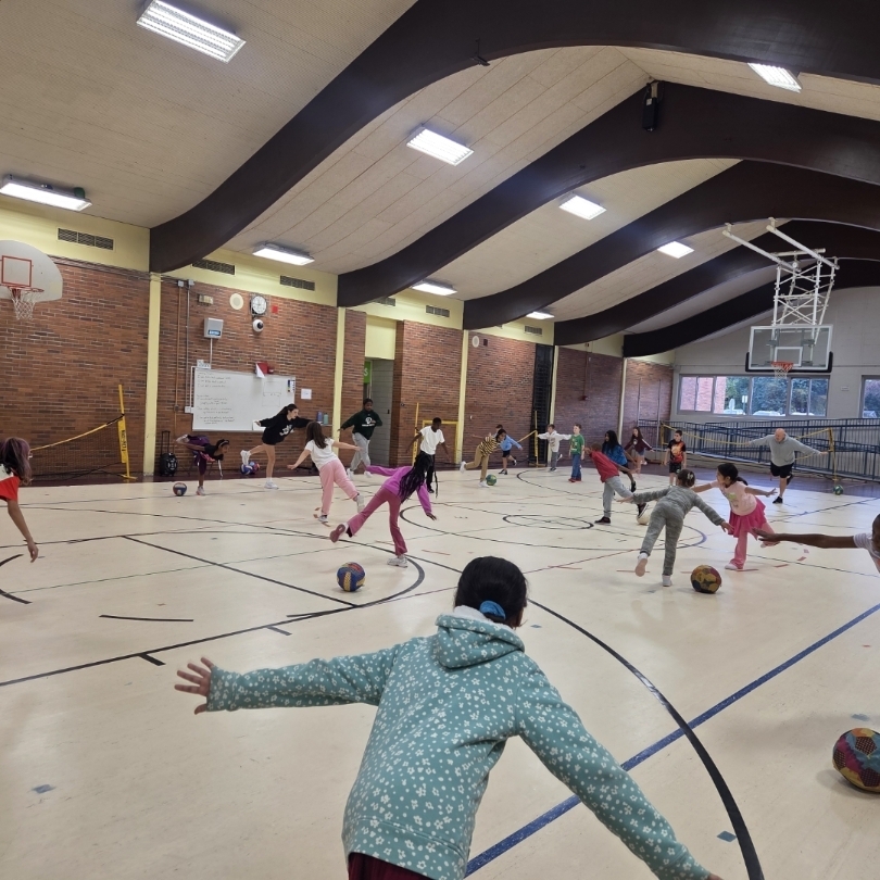 gym class with volleyball team members