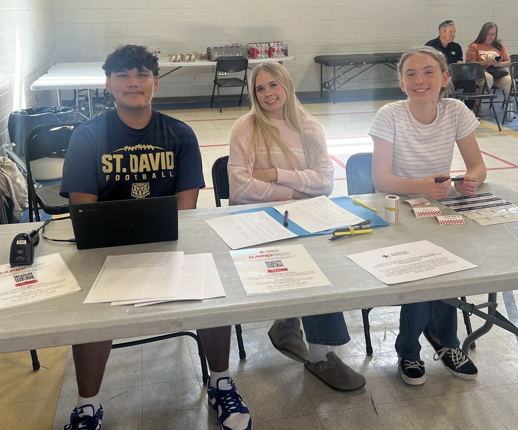 students helping at blood drive