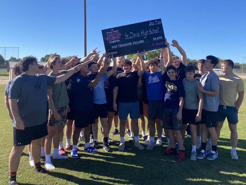football team with T-Mobile check