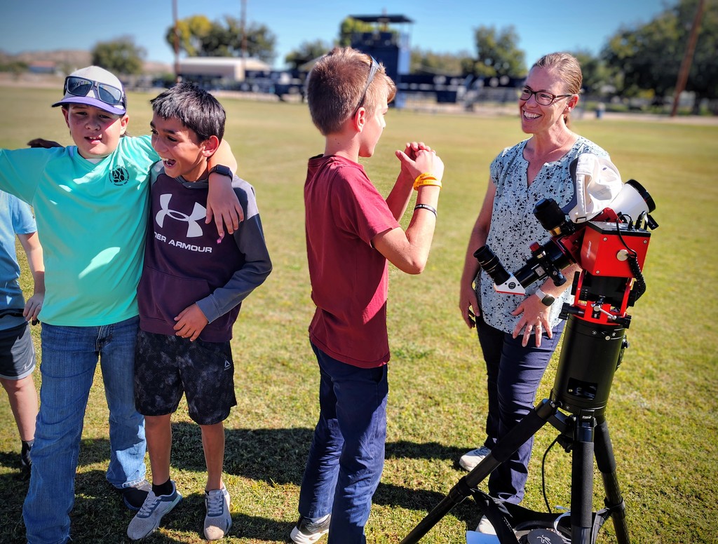 student talking to teacher