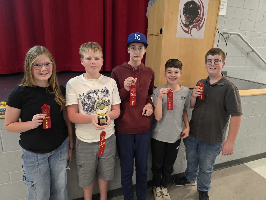 Students holding ribbons