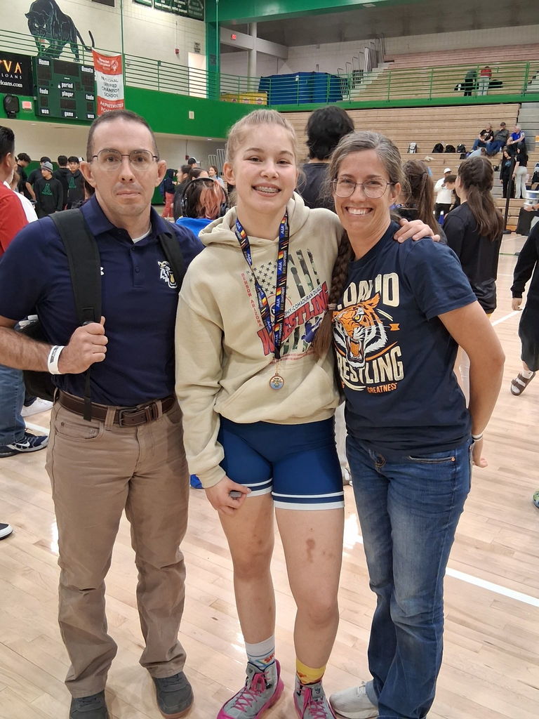 wrestler and coaches