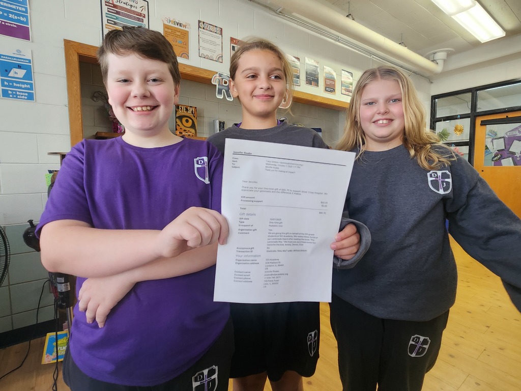Aniela, Devon and Ellie make the 2nd half of their donation to Silver Cross Hospital, Pediatrics