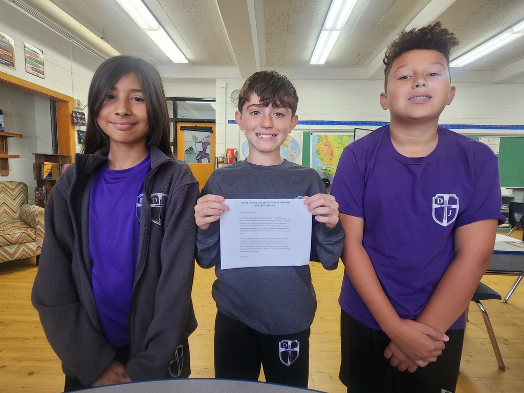 Brody, Noah and Valentina make their donation to the " Make a Wish" foundation.