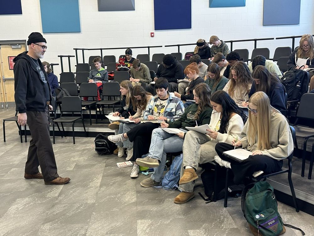 Nate Boots with creative writing class