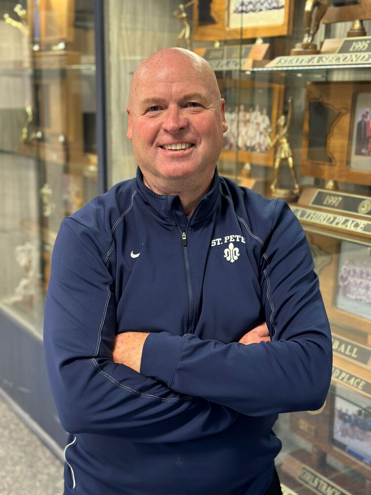 Saints girls track head coach Jeff Portugue