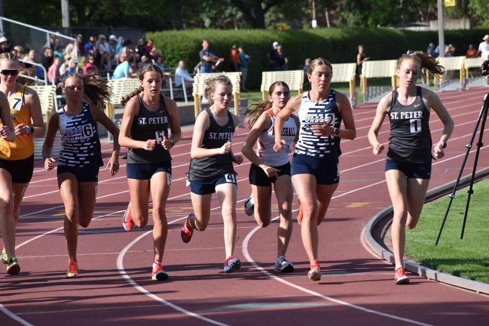 Saints running during Section 2AA 3,200-meter race