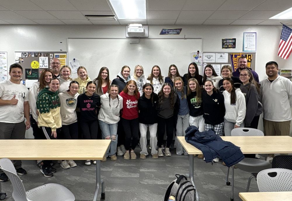 Megan Vogel with current Saints' girls BB team & coaches
