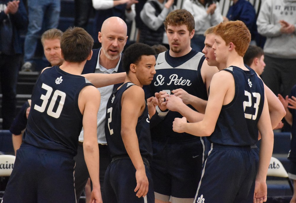 Saints' boys basketball coach Sean Keating with some words for his team in 2026