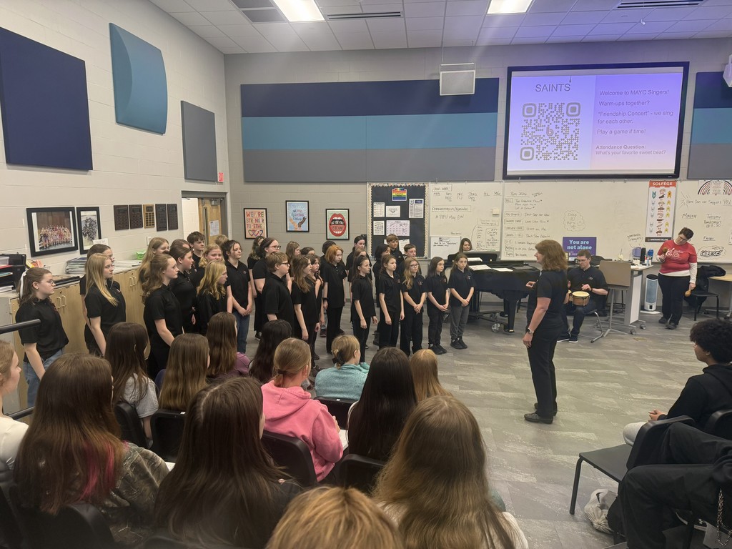 MAYC visiting with SPHS Saints Choir members