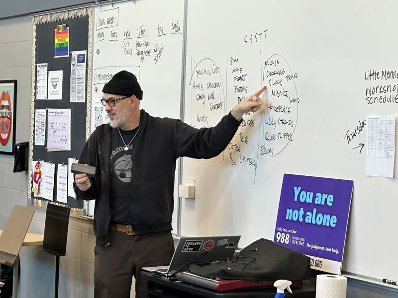 Nate Boots meeting with creative writing students