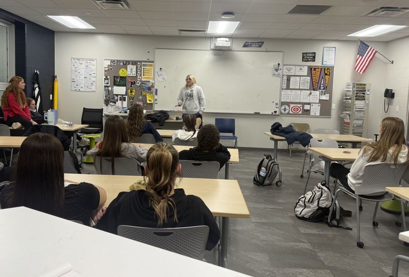 Megan Vogel speaking to the Saints girls BB team