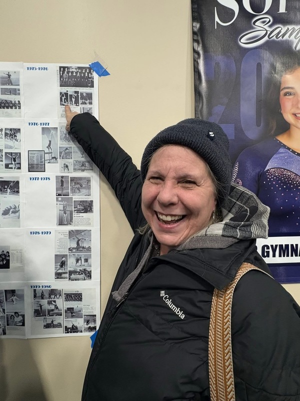 Colleen (Conner) Hanson at gymnastics meet.