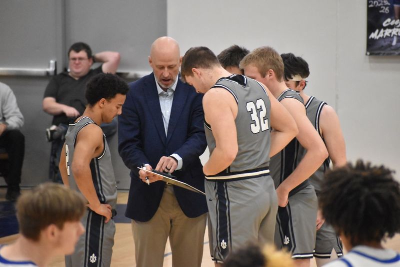 Coach Keating with some last second pre-game prep with the 2025-26 Saints' squad!