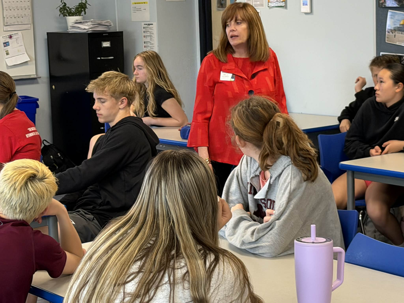 Della Schmidt visiting with SPMS eighth graders.