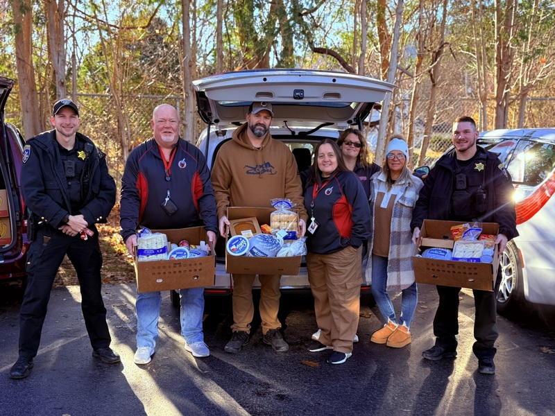 Staff Holding Food Boxes for delivery