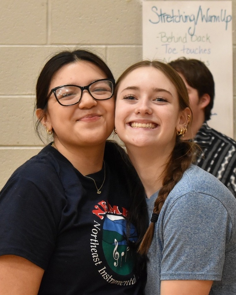two girls smiling for the camera