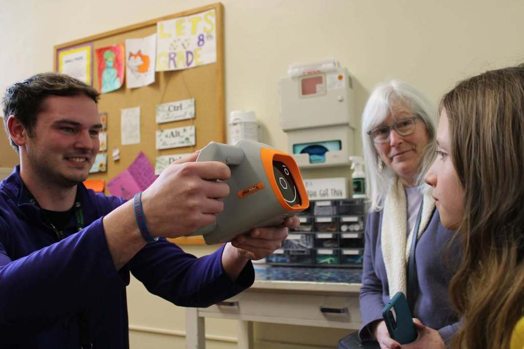 school nurse tests child's vision