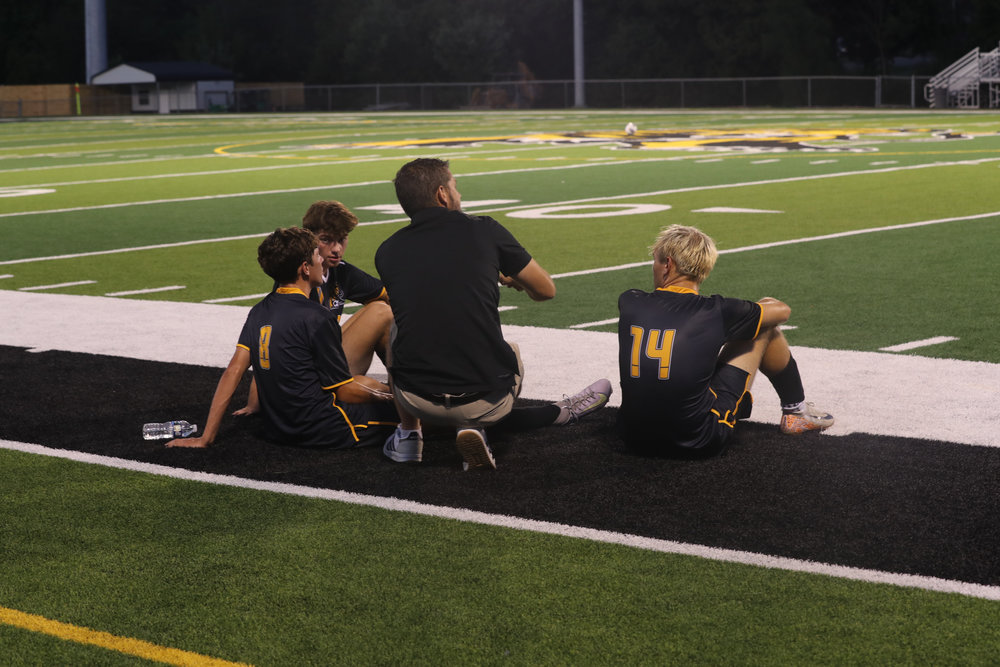 Coach Putnam with seniors