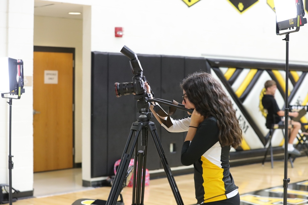 Valerie taking photos at media day