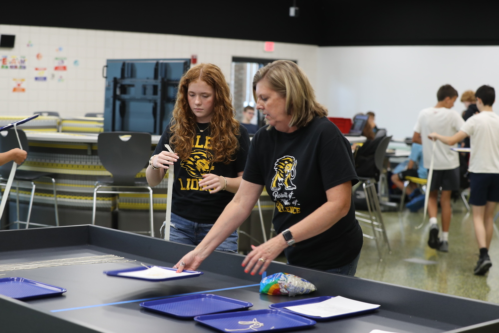 Jessica Morgan helping a student in the STEAM Lab