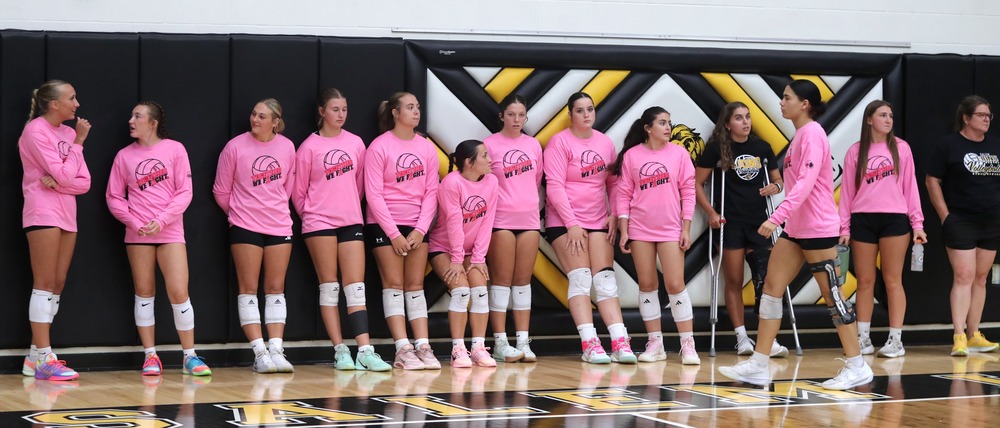 wearing pink for their coach