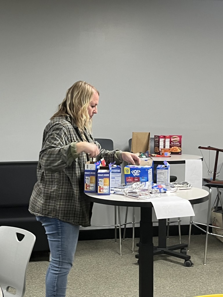 Student council members packing up food