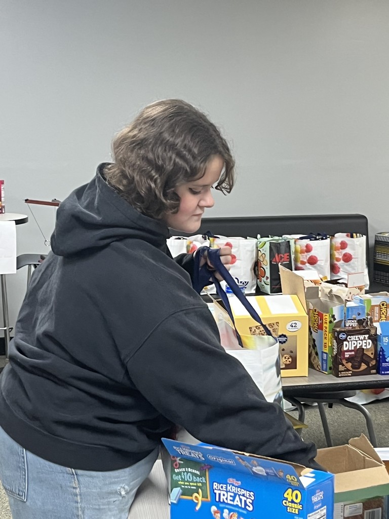 Student council members packing up food