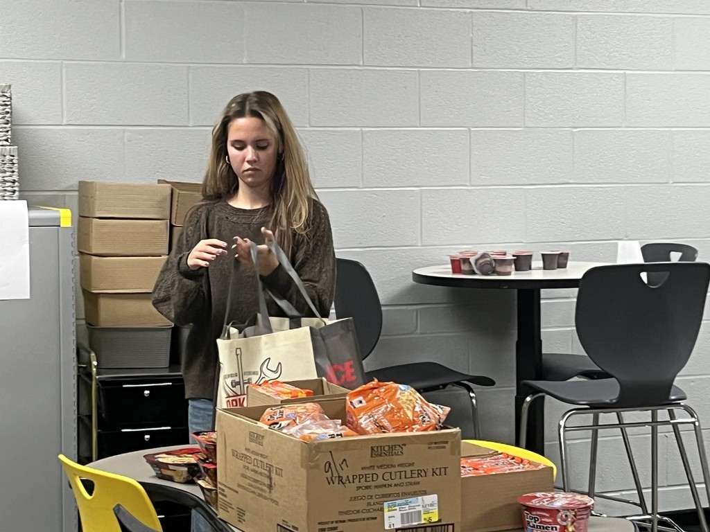 Student council members packing up food