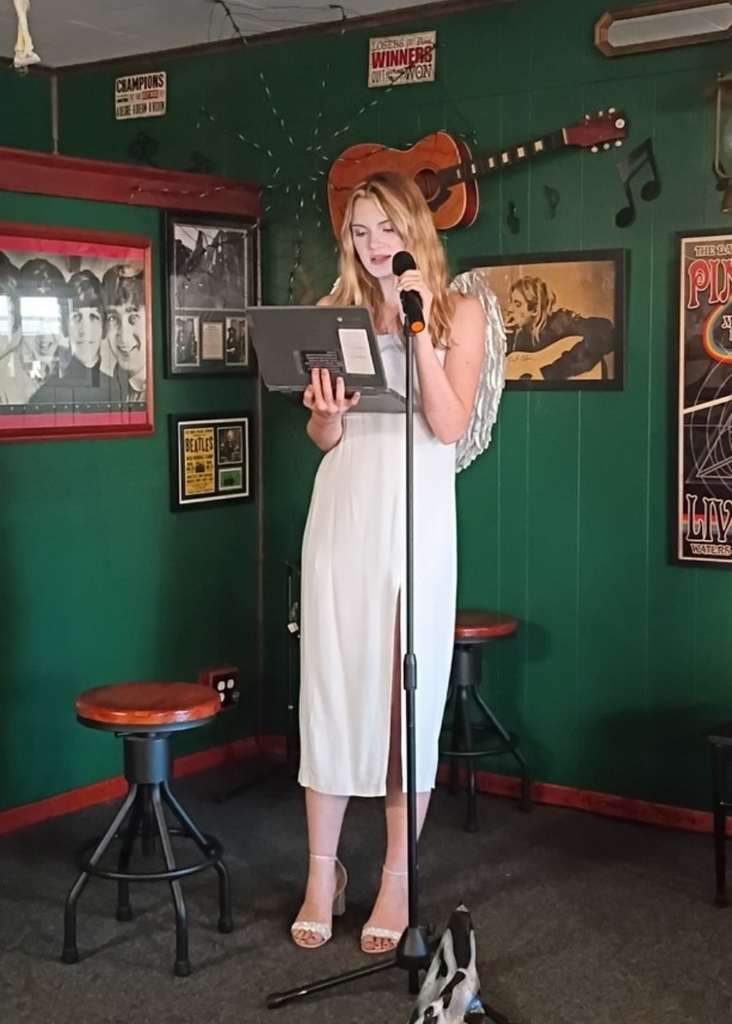 Angel reading a poem
