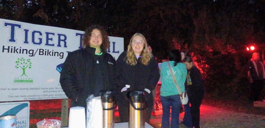 Students serving hot chocolate
