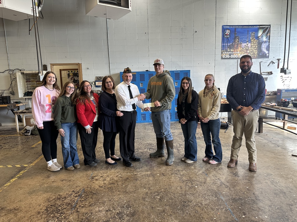 Officers pictured: Abbi Terrill (Secretary), Dalli Johnson (Vice President), Heather Johnson (FFA Instructor/Sponsor), Hazel Krewson (VFW 6337 Auxiliary Member/SHS Teacher), Licking VFW 6337 Post Commander Billie Krewson, James Heithold (President), Zoe Cochran (Treasurer), Madi Ming, Dalton Sanders (FFA Instructor/Sponsor).