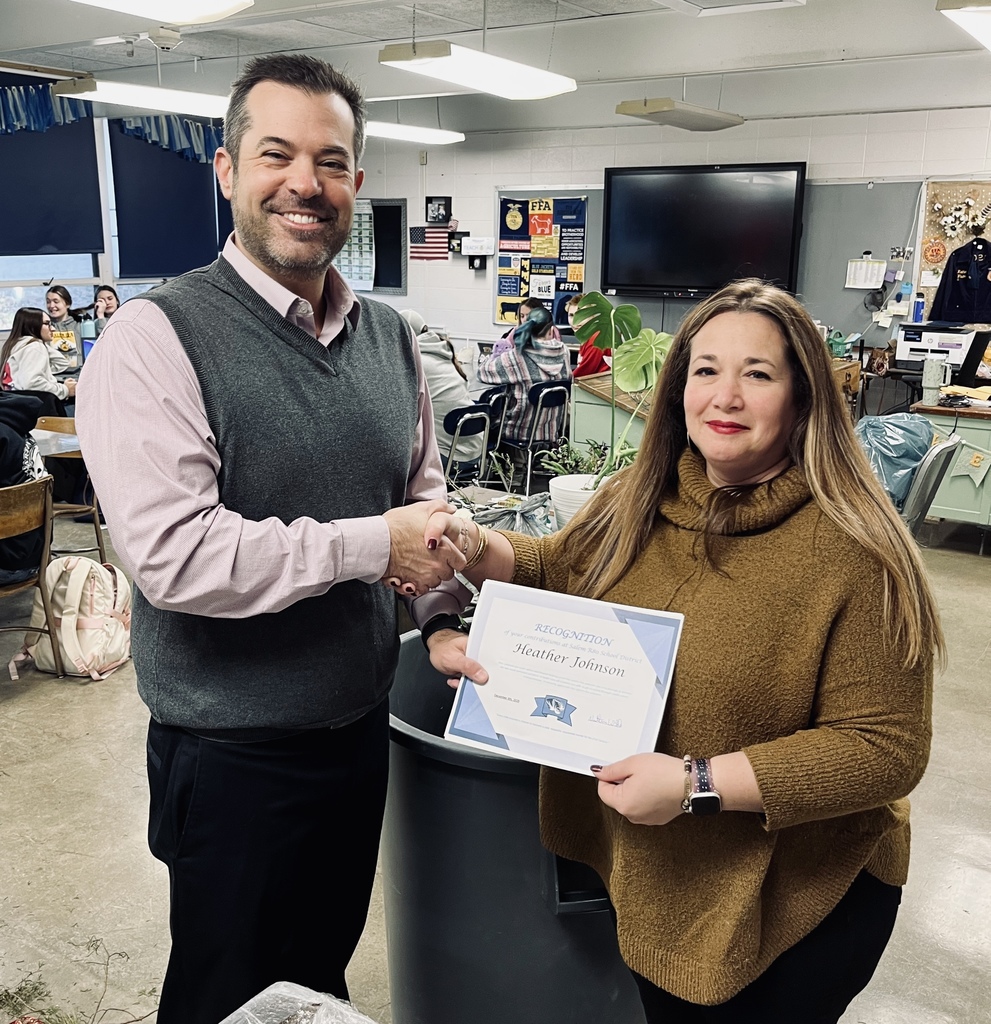 Mrs. Vaughan and Mrs. Johnson December Staff Member and Teacher of the Month for December.