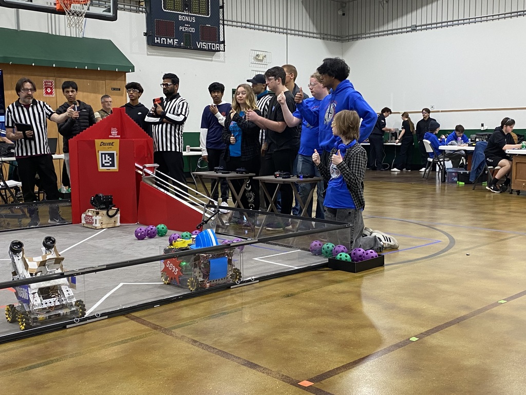 Trinity Haas, Wyatt Gearhart, (Nicholas Thies behind) give the thumbs up to signal Blue Team is ready to begin.