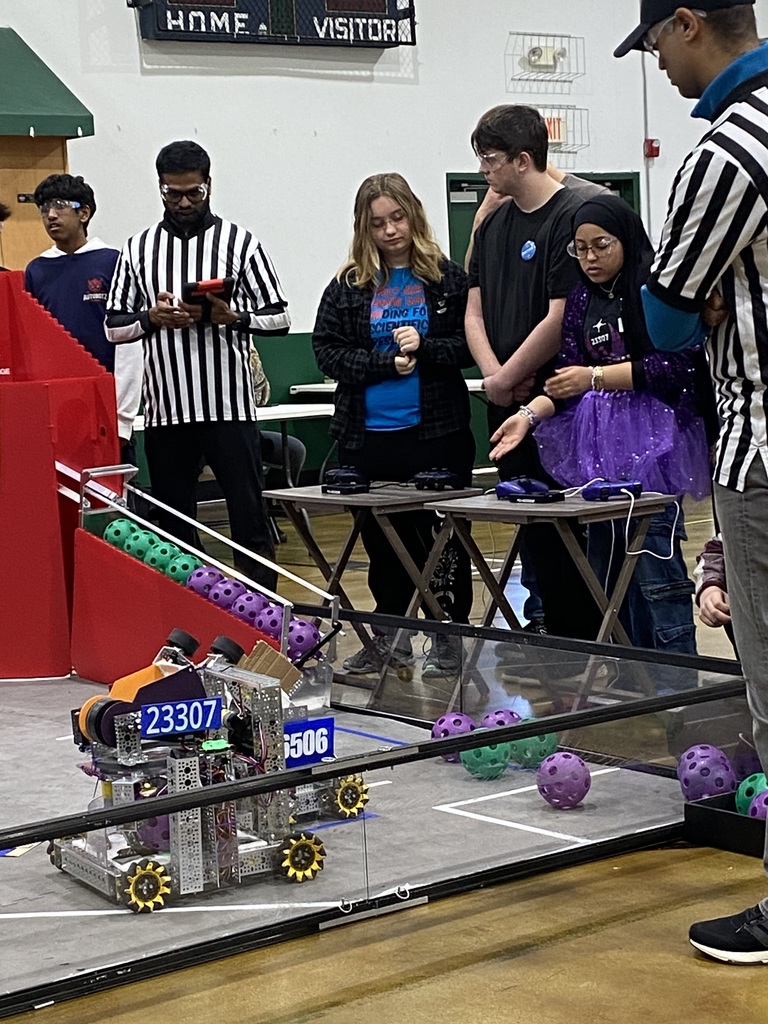 Trinity Haas and Wyatt Gearhart successfully park the robot at the end of the match for points.