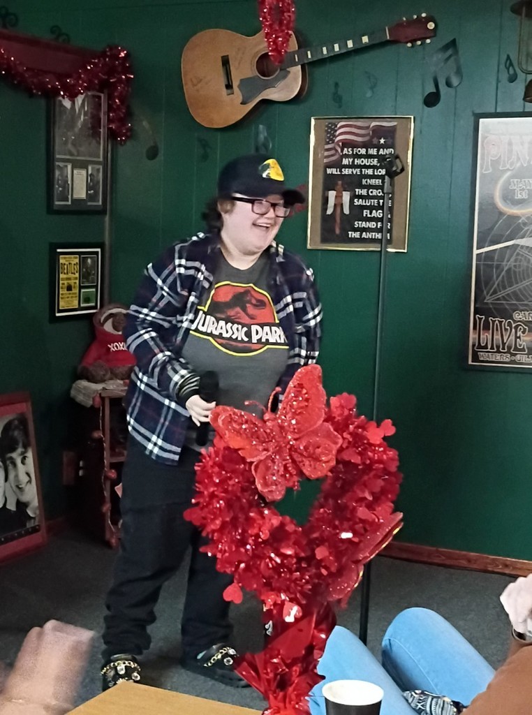 Students performing a poem on stage