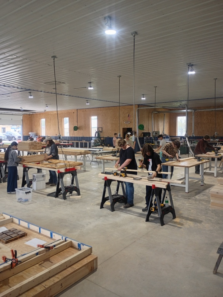 students building beds 