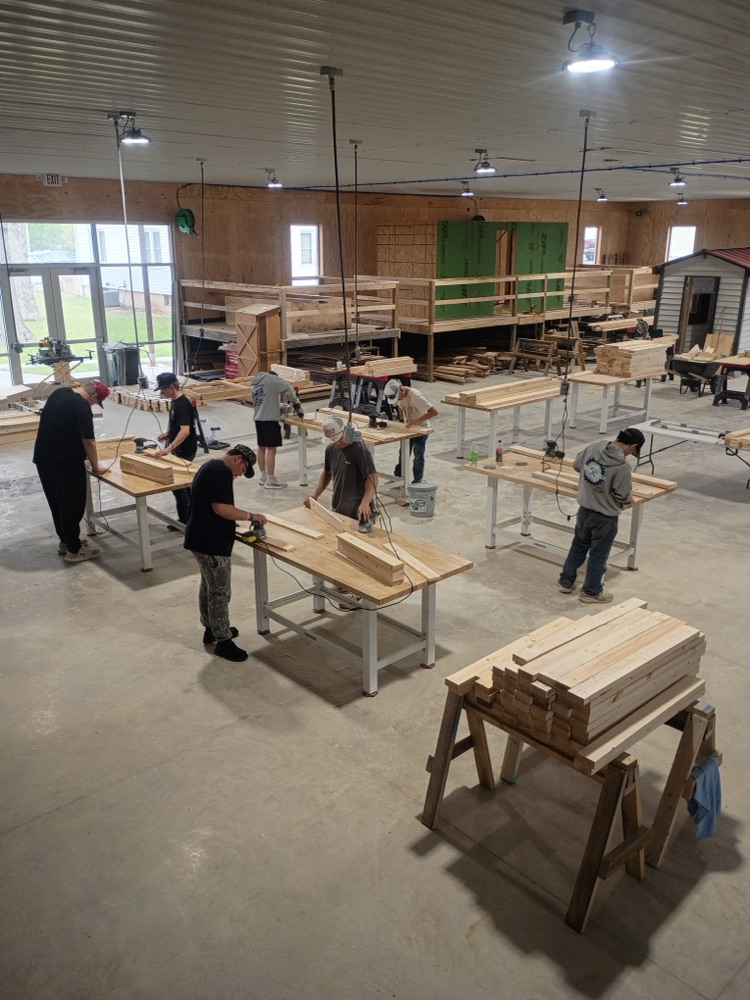 students building beds 
